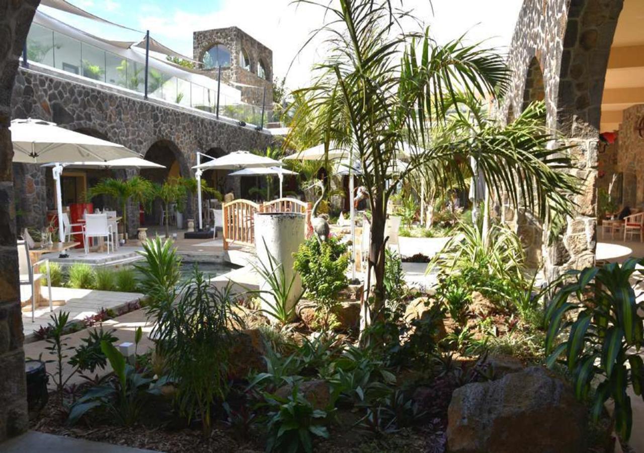 Hacienda Plaza Hotel Pereybere Beach Buitenkant foto